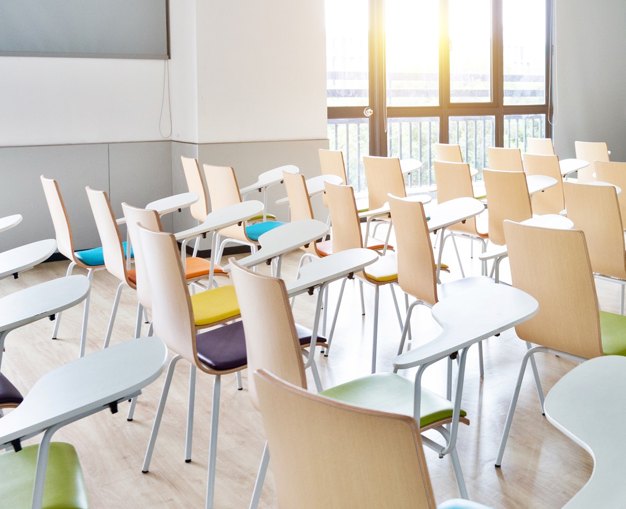 Empty seats in a classroom.